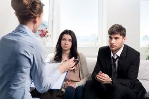 Young couple with a problem to consult a psychologist